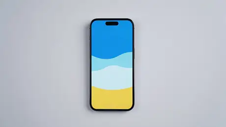 Apple iPhone 14 Pro lying flat showing its triple camera array