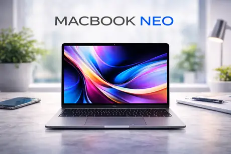 Compact MacBook Neo laptop on a clean white desk