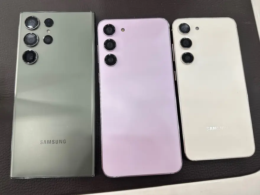 Samsung Galaxy smartphones arranged side by side showing their camera modules and displays
